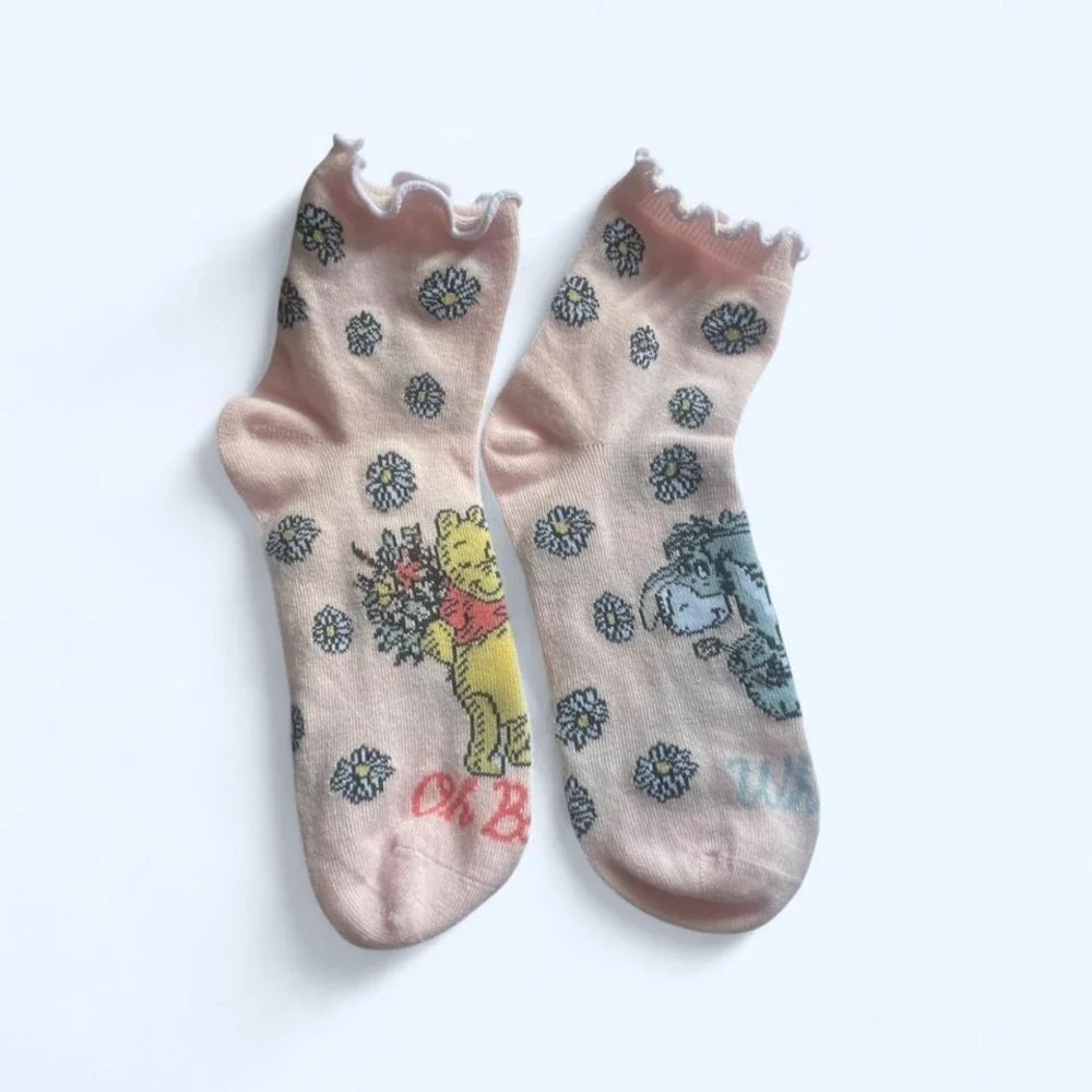 Winnie the Pooh and Eeyore socks by‎ Disney